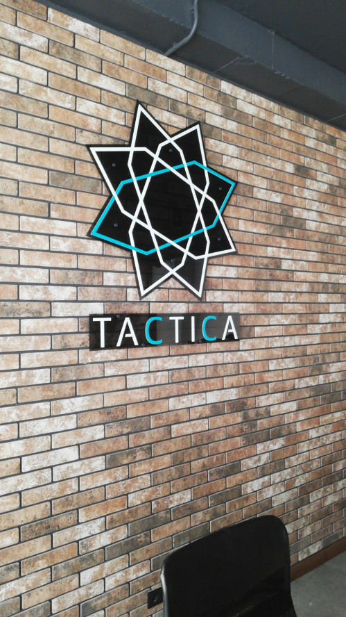 Interior sign for "Tactica" company