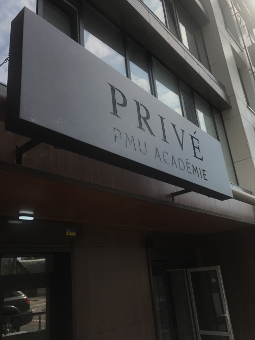 Light sign for the company "Prive"